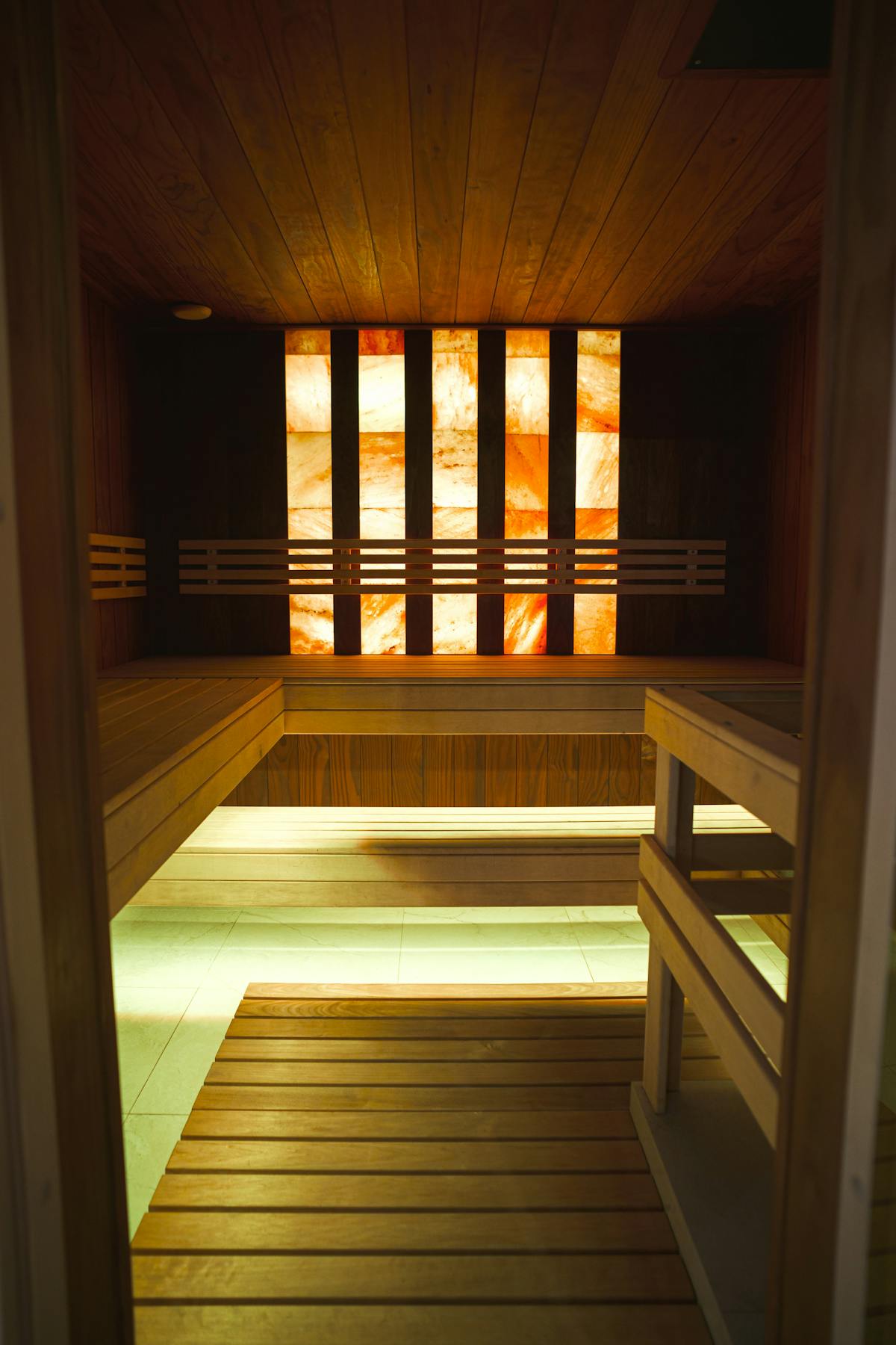 The salt grotto at Aquaria Thermal SPA Sirmione with reclining chairs and pink Himalayan salt walls